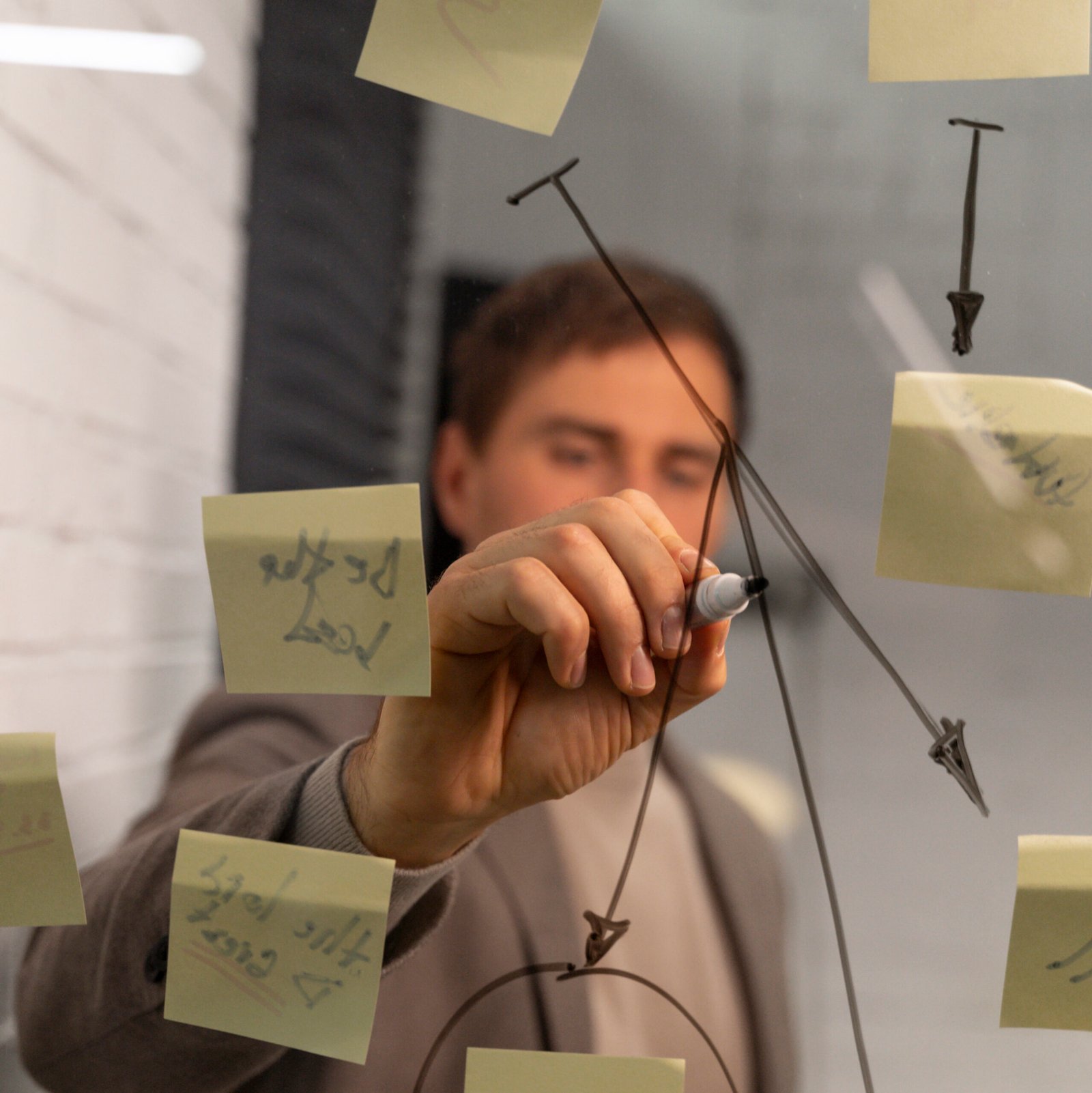 Propietario De Negocio Trabajando En Su Estrategia Edited Scaled